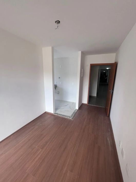 Apartamento 2 dormitórios, com garagem no bairro Costa e Silva.