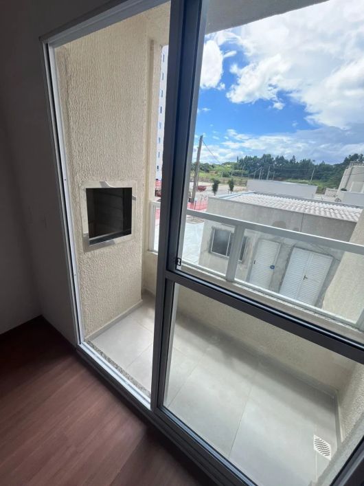 Apartamento 2 dormitórios, com garagem no bairro Costa e Silva.