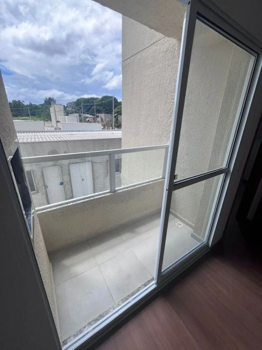 Apartamento 2 dormitórios, com garagem no bairro Costa e Silva.