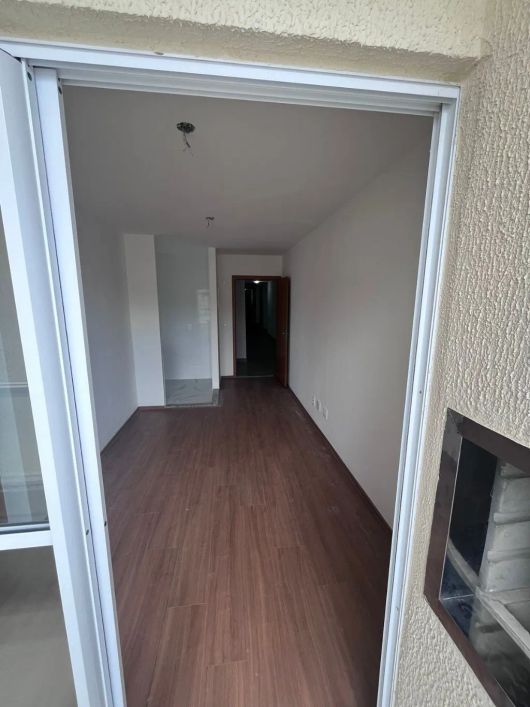 Apartamento 2 dormitórios, com garagem no bairro Costa e Silva.