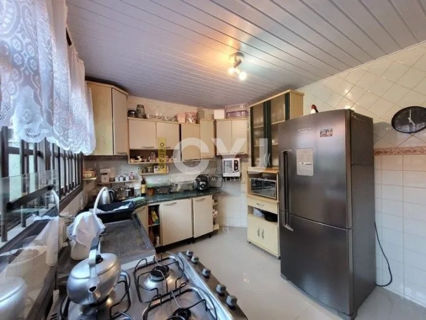 Casa 4 dormitórios no bairro Hípica, Porto Alegre