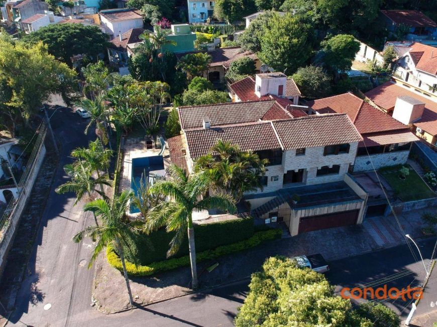 Casa com 3 dormitórios para alugar, 667 m² por R$ 11.690,00/mês - Guarujá - Porto Alegre/RS