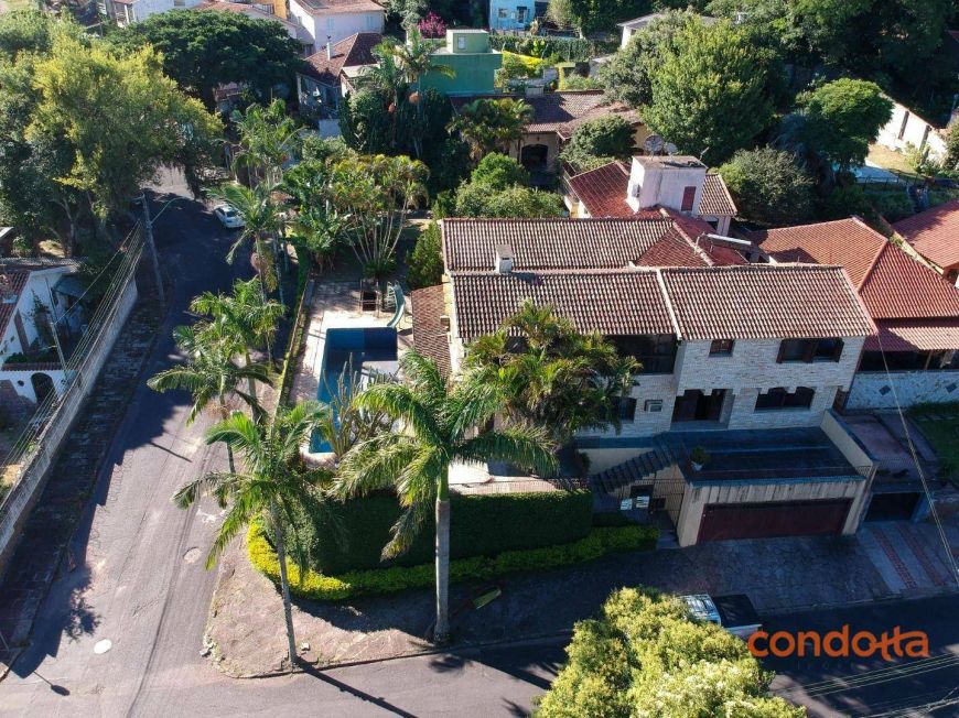 Casa com 3 dormitórios para alugar, 667 m² por R$ 11.690,00/mês - Guarujá - Porto Alegre/RS