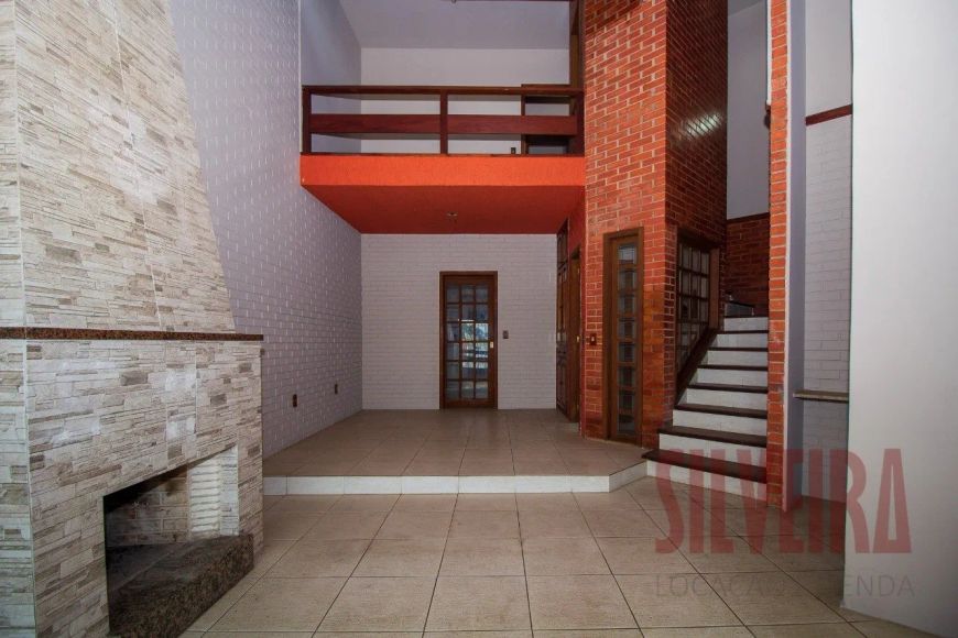 CASA COM PISCINA E 4 DORMITÓRIOS - CRISTO REDENTOR