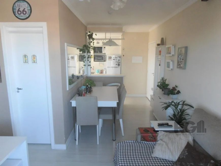 Ótimo apartamento com 62,73m² de área privativa distribuídos em living para dois ambientes com sacad