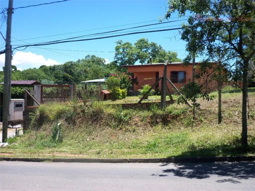 Casa residencial à venda, Vila Nova, Porto Alegre.