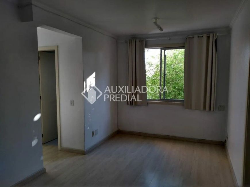 Apartamento de 2 quartos com vaga, próximo a PUC-RS.