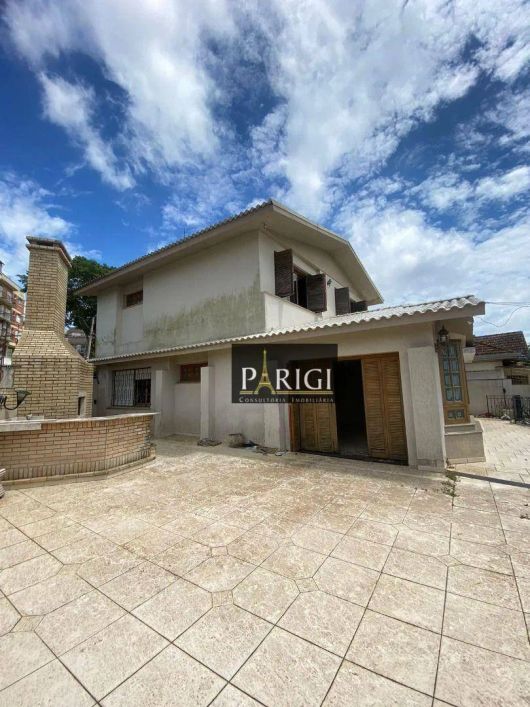 Casa com 3 dormitórios para alugar, 310 m² por R$ 5.315,00/mês - Teresópolis - Porto Alegre/RS