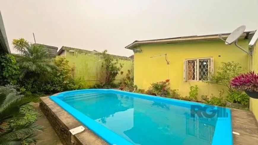 Casa em Porto Alegre, no bairro Ipanema, com 4 dormitório(s), e 4 banheiros, à venda.