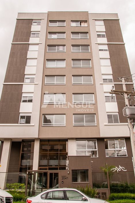 Apartamento com 2 dormitórios e 1 vaga à venda no bairro São João em Porto Alegre.