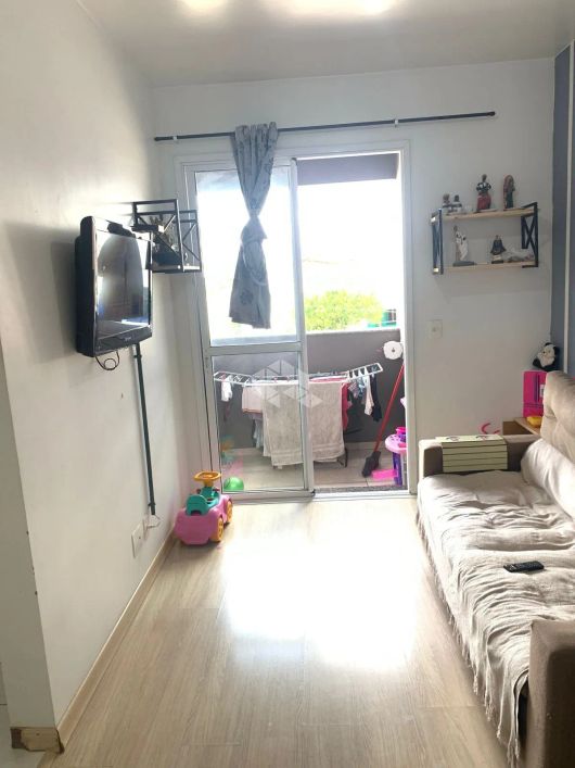 Apartamento com 51m com 2 dormitórios uma vaga de garagem, co churrasqueira no bairro Santa Fé.