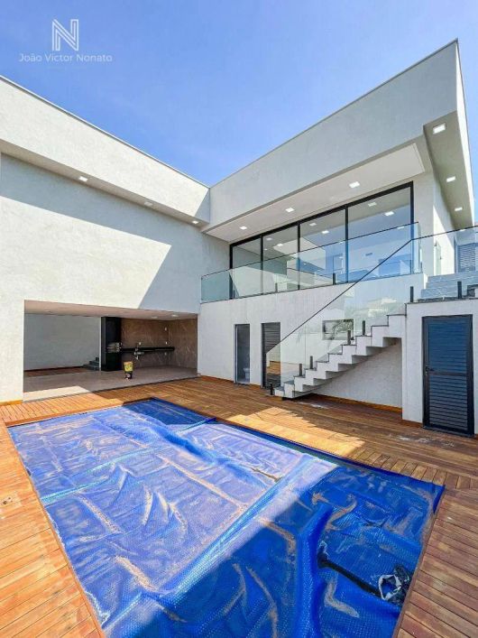 Casa com 3 dormitórios à venda, 290 m² por R$ 2.300.000,00 - Condomínio do Lago - Goiânia/GO
