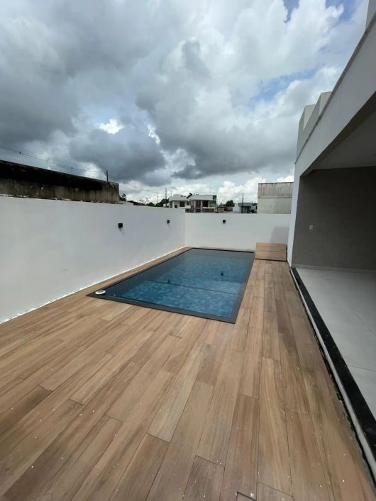 Bacelar Imóveis vende bela casa com 3 suítes no condomínio Jardins do Lago