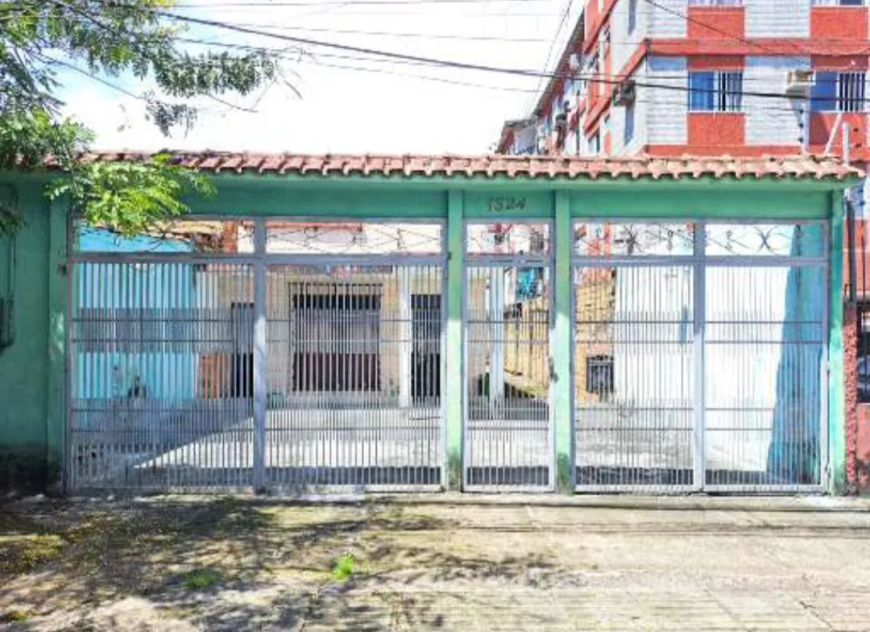 Terreno com casa na Marquês de Herval para investidores