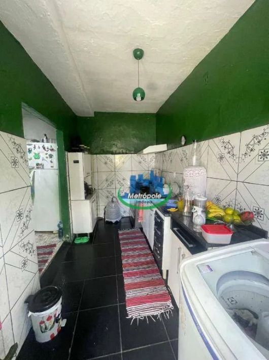 Casa com 5 dormitórios à venda, 214 m² por R$ 1.700.000 - Jardim Tamassia - Guarulhos/SP