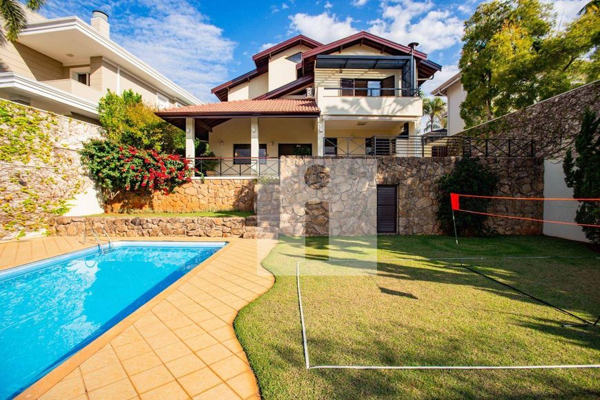 Casa para venda alto padrão com 4 quartos sendo 2 suítes, 1 térrea, no condomínio Arboreto dos Jequi
