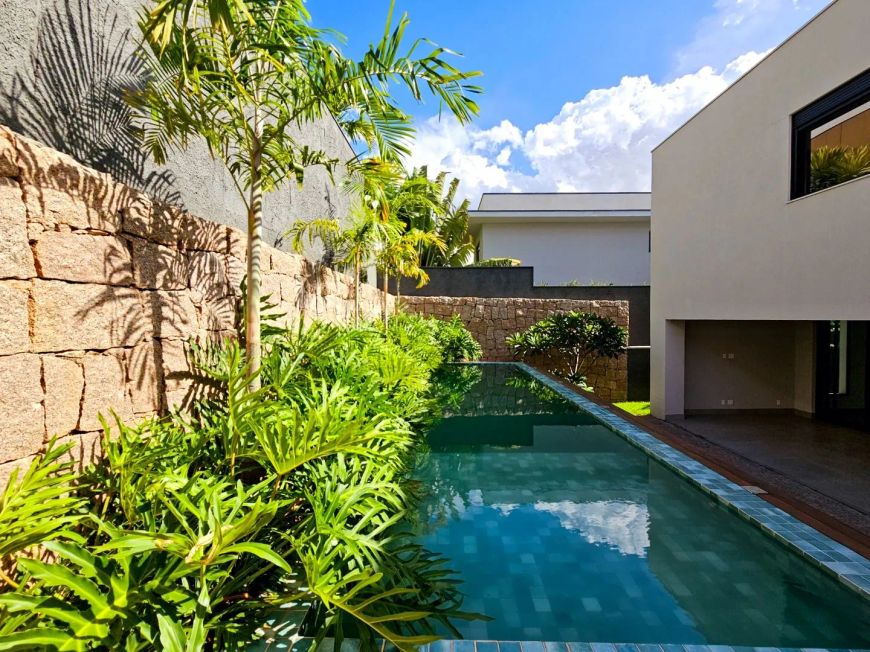 Casa com 4 dormitórios à venda, 343 m² por R$ 3.750.000 - Condomínio Alphaville Dom Pedro - Campinas