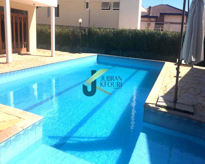 Casa para venda/aluguel no Alphaville Campinas, 5 dormitórios (4 suítes), piscina e garagem para vár