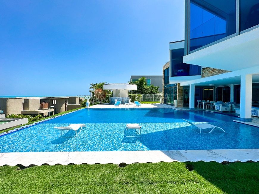 Casa de cinema com vista panorâmica do mar em condomínio fechado. (Aceita PERMUTA por imóvel de meno