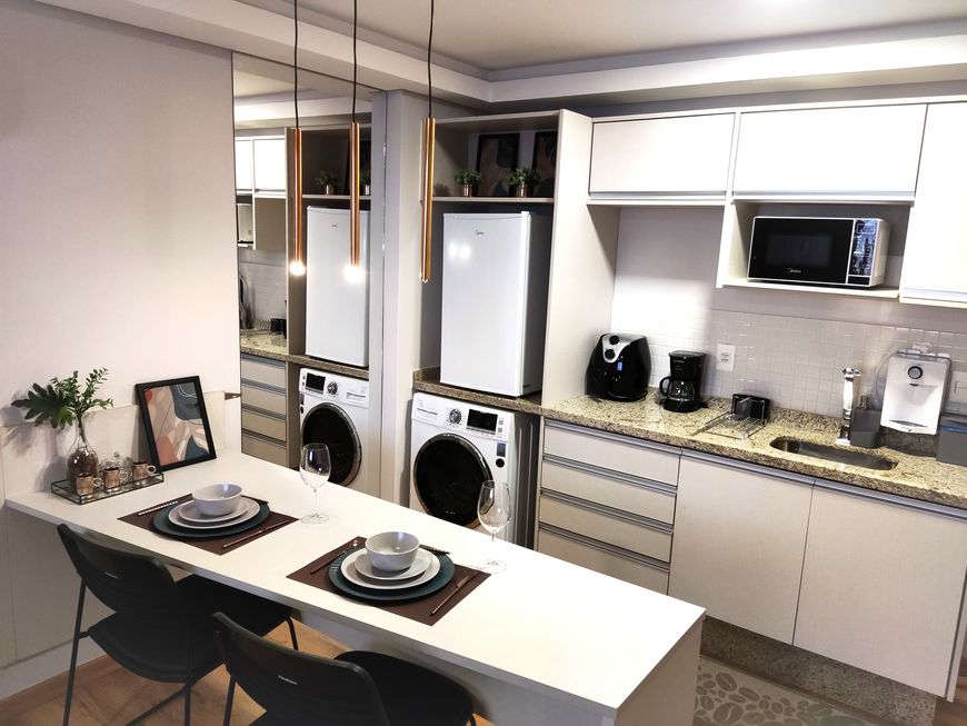 Flat Suíte Confortável com Cama Queen e Cozinha Americana