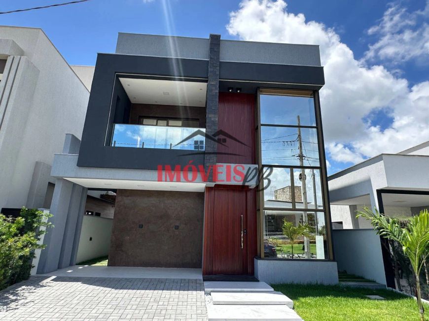 casa em condomínio fecha com com 4 suítes.