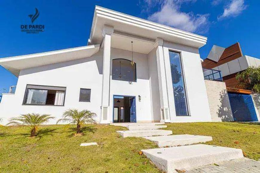 Sobrado com 4 dormitórios à venda, 337 m² por R$ 3.550.000,00 - Condomínio Residencial Monte Carlo -
