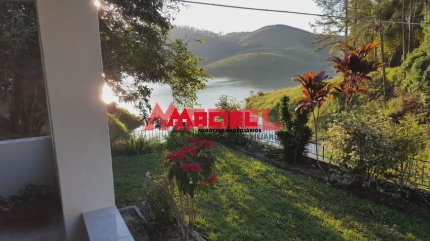 CHÁCARA COM ESCRITURA REGISTRADA, COM CACHOEIRA, TRATOR, POMAR E TRILHA