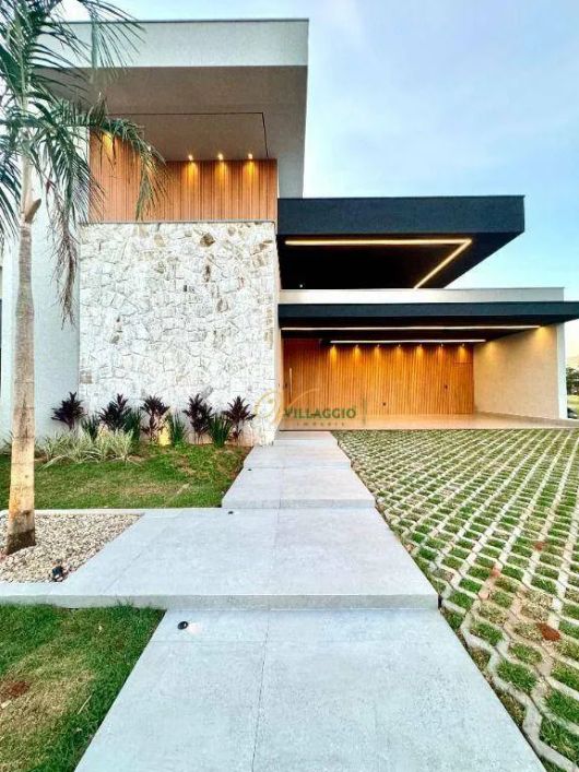 Casa com 4 dormitórios à venda, 280 m² por R$ 4.200.000,00 - Quinta do Golfe Jardins - São José do R
