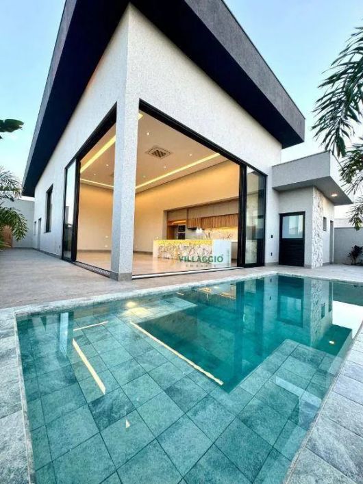 Casa com 4 dormitórios à venda, 280 m² por R$ 4.200.000,00 - Quinta do Golfe Jardins - São José do R