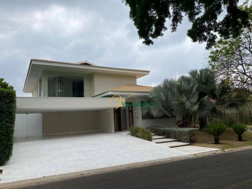 Casa com 4 dormitórios à venda, 502 m² por R$ 5.500.000,00 - Condomínio Green Palm - São José do Rio