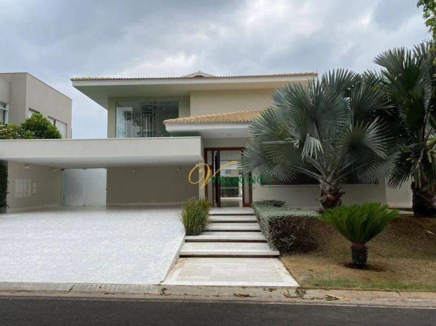 Casa com 4 dormitórios à venda, 502 m² por R$ 5.500.000,00 - Condomínio Green Palm - São José do Rio