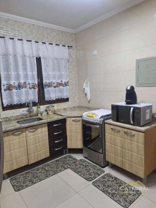 Casa com 3 dormitórios à venda, 119 m² por R$ 640.000,00 - Jardim Caçula - Jundiaí/SP