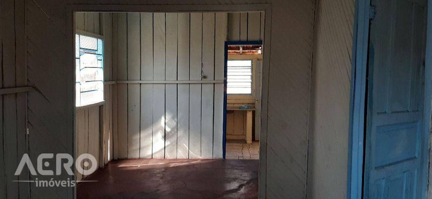 Excelente terreno com duas casas de madeira.