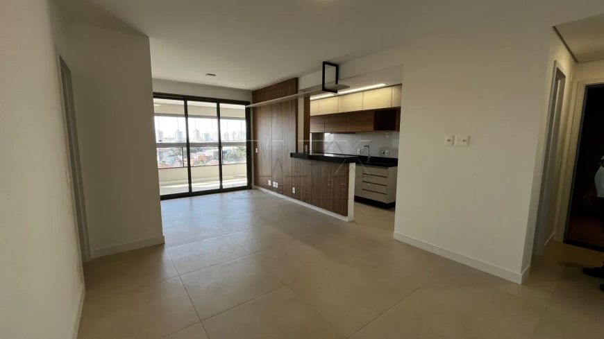 Apartamento com tres quartos sendo um suite, duas vagas de garagem e um deposito