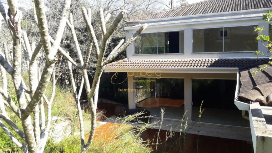CASA EM CONDOMINIO - 4 SUITES, JARDIM, ESPACO GOURMET.