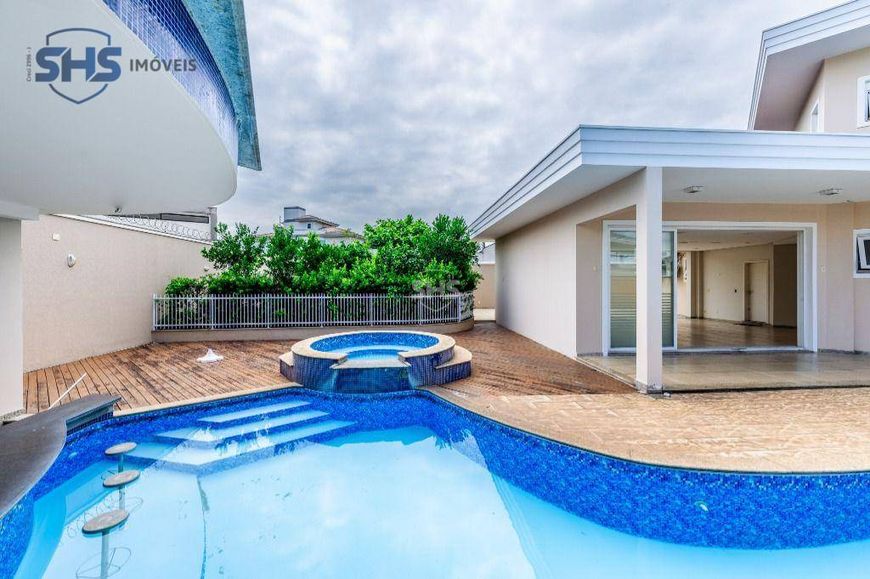 Casa em loteamento monitorado, com piscina e 5 dormitórios à venda, 452 m² por R$ 3.000.000 - Itoupa