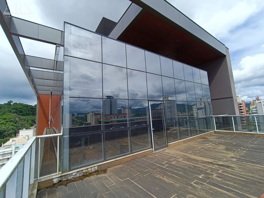 Ampla sala comercial mobiliada para locação na Vila Nova.