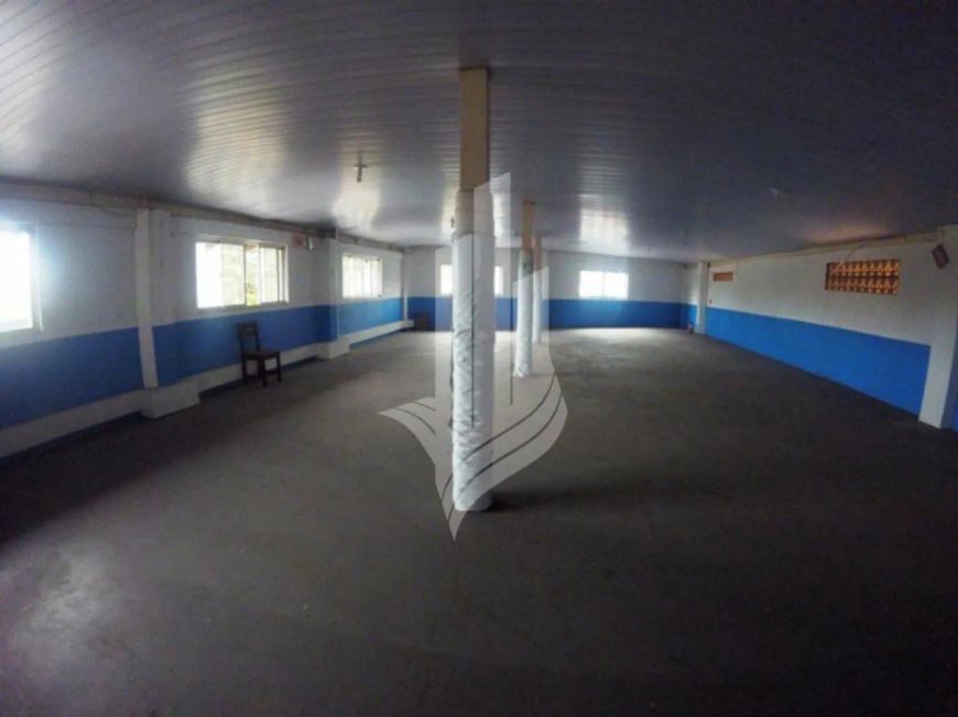 Sala em frente a Cooper Omino