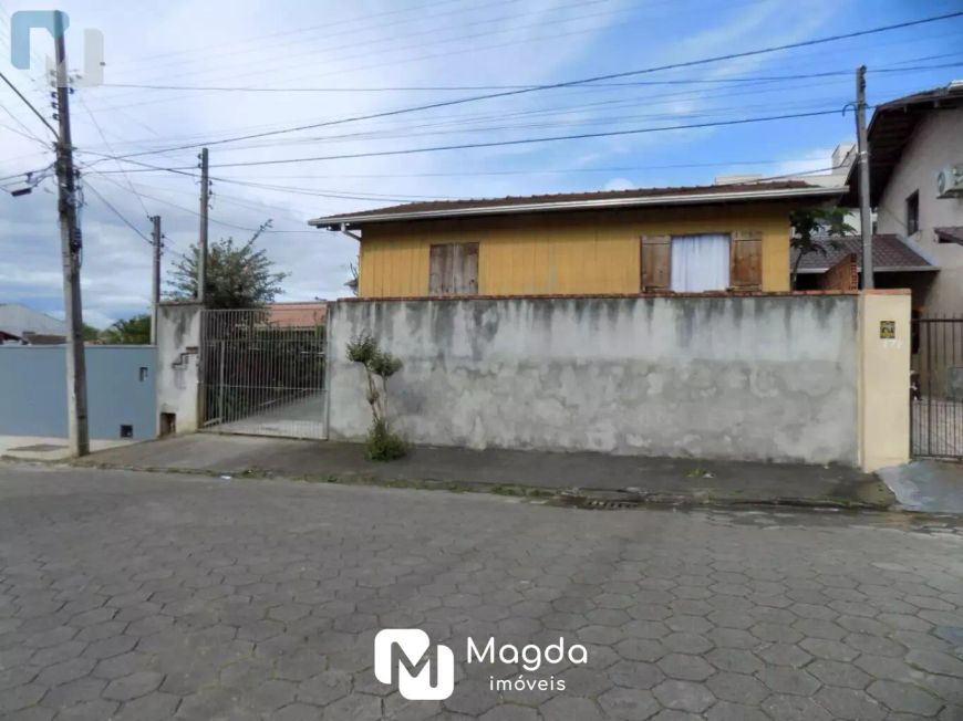 Terreno com casa