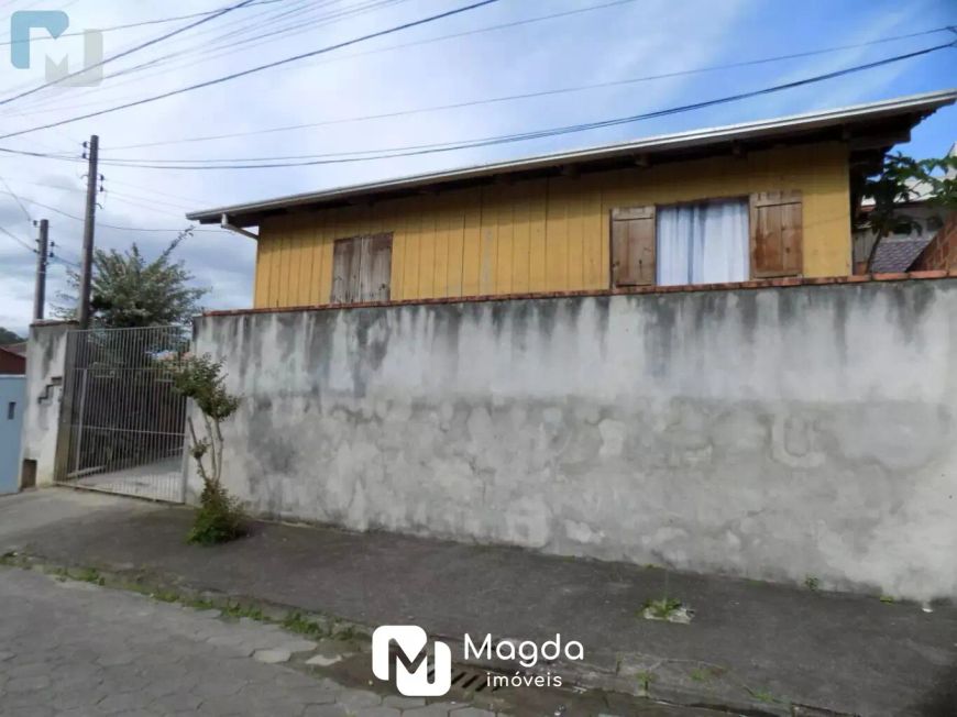 Terreno com casa