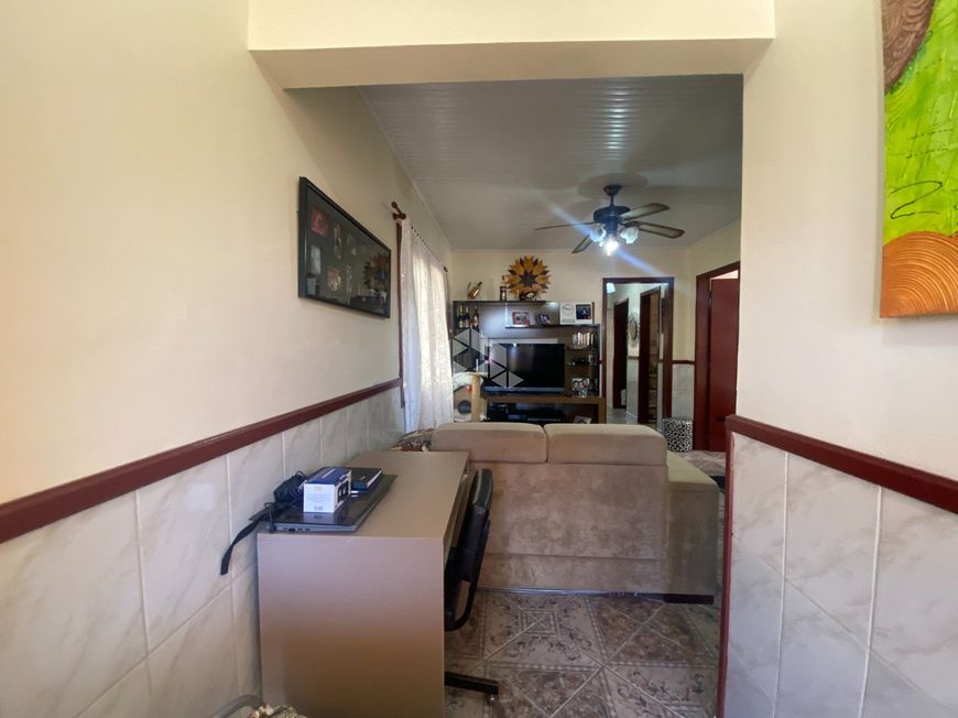 Casa plana com 4 dormitórios, sendo 01 suíte, Canoas/Bairro Niterói