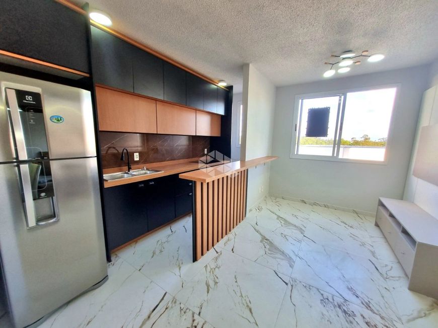 Apartamento 2 dormitórios condomínio fechado com elevador Bairro Olaria com vaga