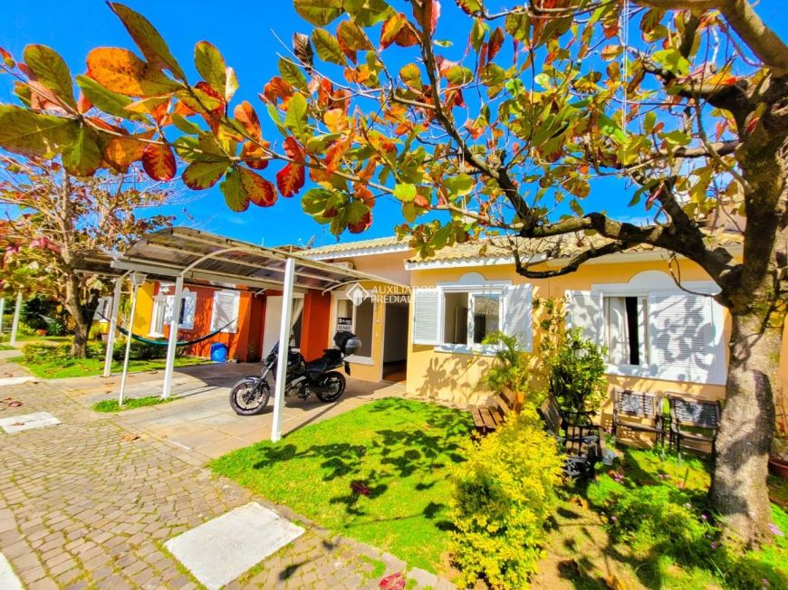 Casa em condomínio fechado semi mobiliada em Canoas no condomínio Malaga