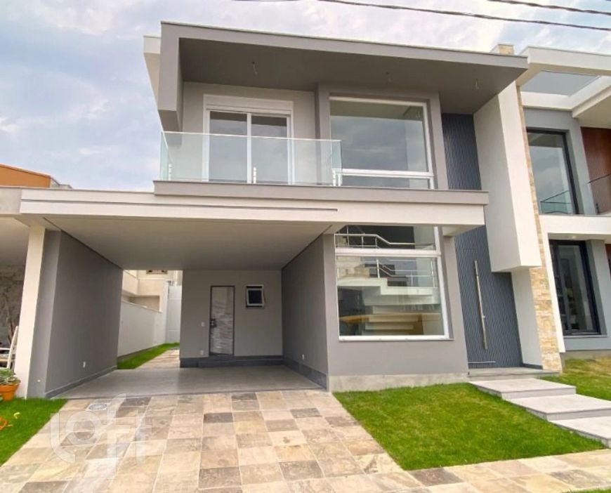 Casa em Condomínio Fechado de 03 suítes, com 4 vagas de garagem no bairro Igara em Canoas
