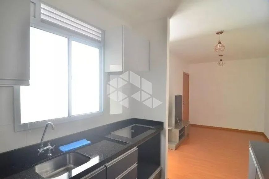 Apartamento semimobiliado, 2 dormitórios, 1 vaga de garagem. Igara-Canoas