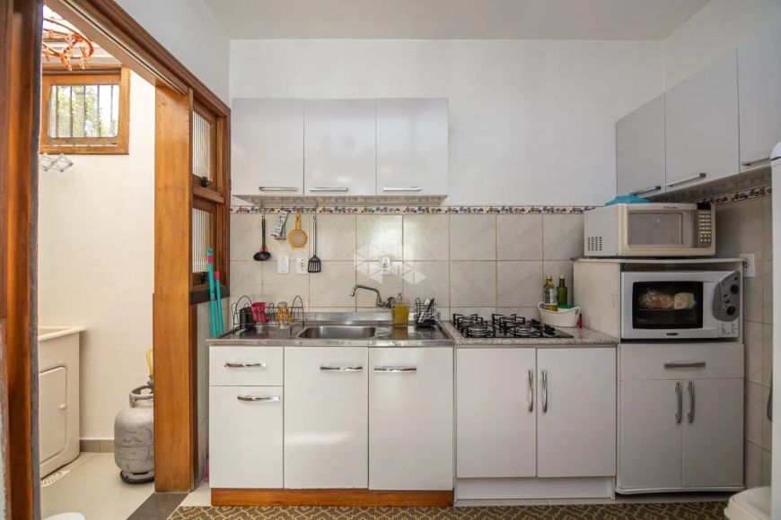 Casa condominio, 58,13 m² de área privadas, 2 dormitórios, living com 3 ambientes, sala de estar, ja