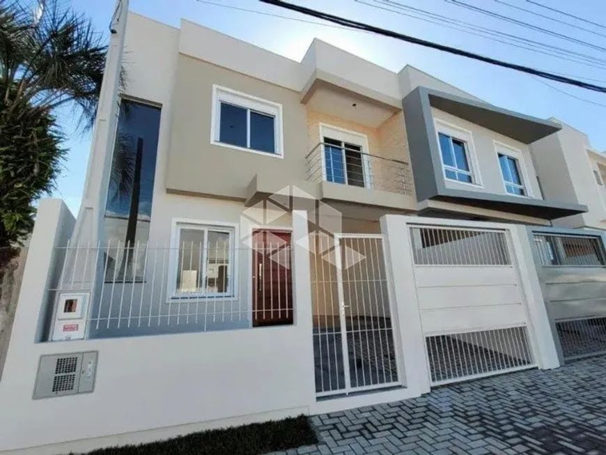 Sobrado novo 3 dormitórios com 1 suíte no bairro Nossa Sra das Graças.