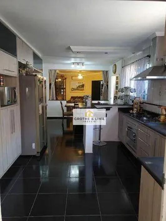 Casa com 3 dormitórios à venda, 180 m² por R$ 600.000,00 - Parque Senhor do Bonfim - Taubaté/SP