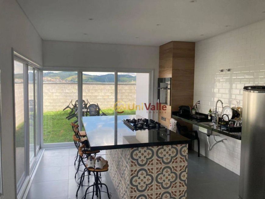 Casa com 3 dormitórios à venda, 130 m² por R$ 900.000 - Condominio Cataguá Way - Taubaté/SP