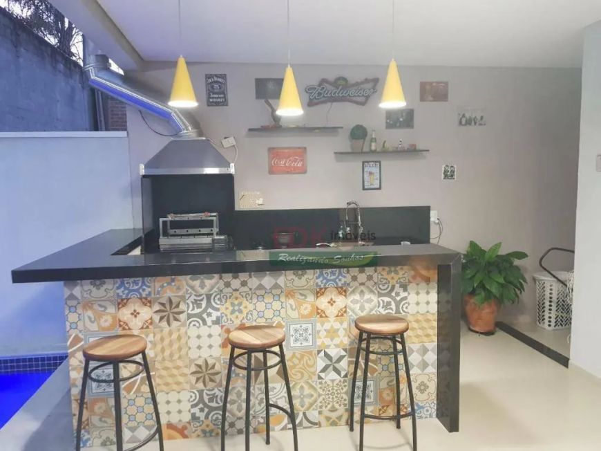 Sobrado com 3 dormitórios à venda, 203 m² por R$ 1.320.000,00 - Condomínio Residencial Tecoara - Tau